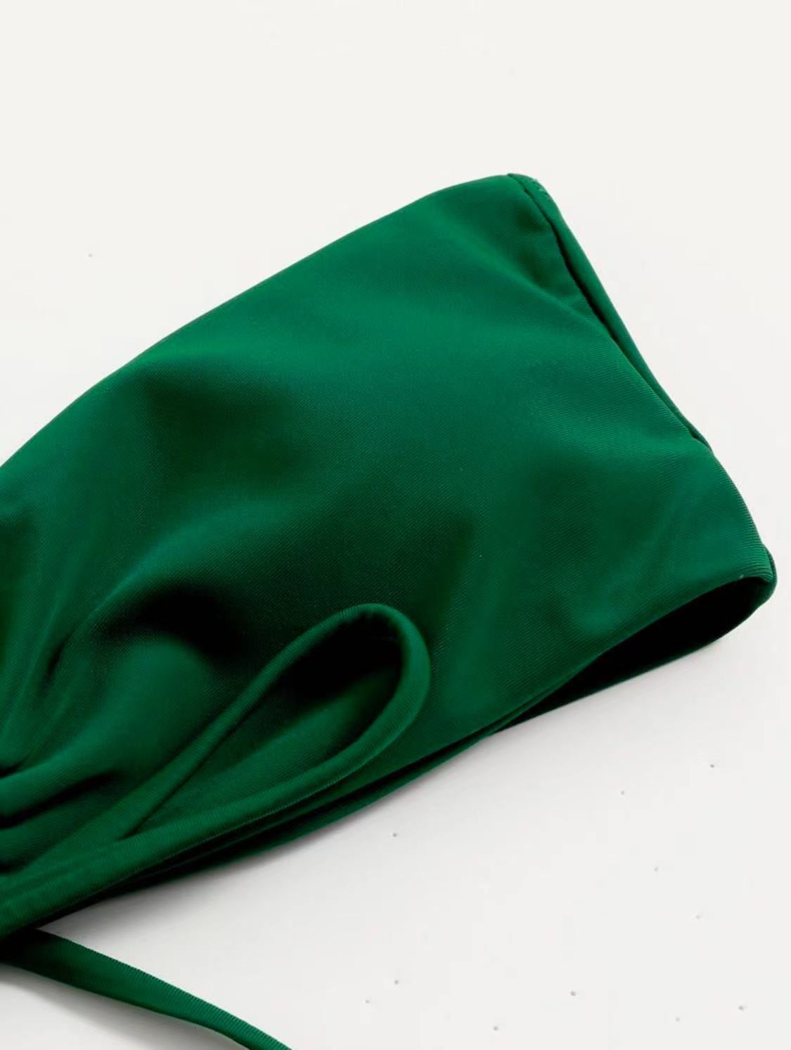 Green headscarf on a white background