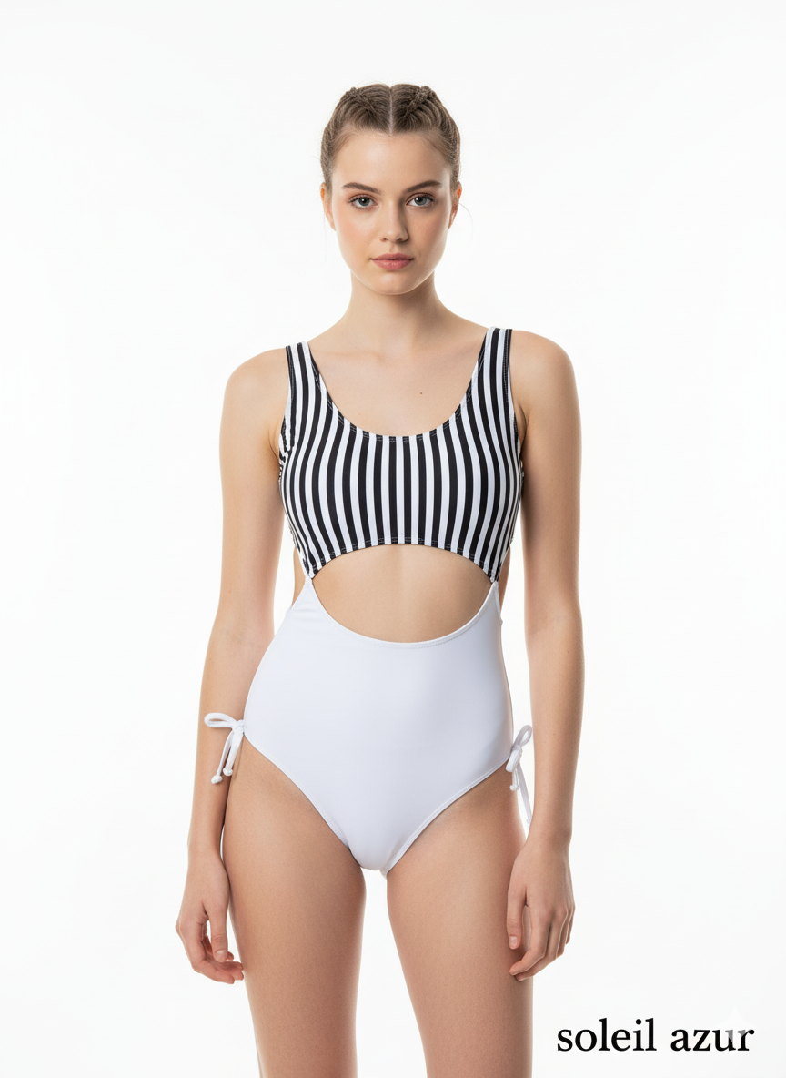 Woman wearing a black and white striped swimsuit with 'soleil azur' branding.