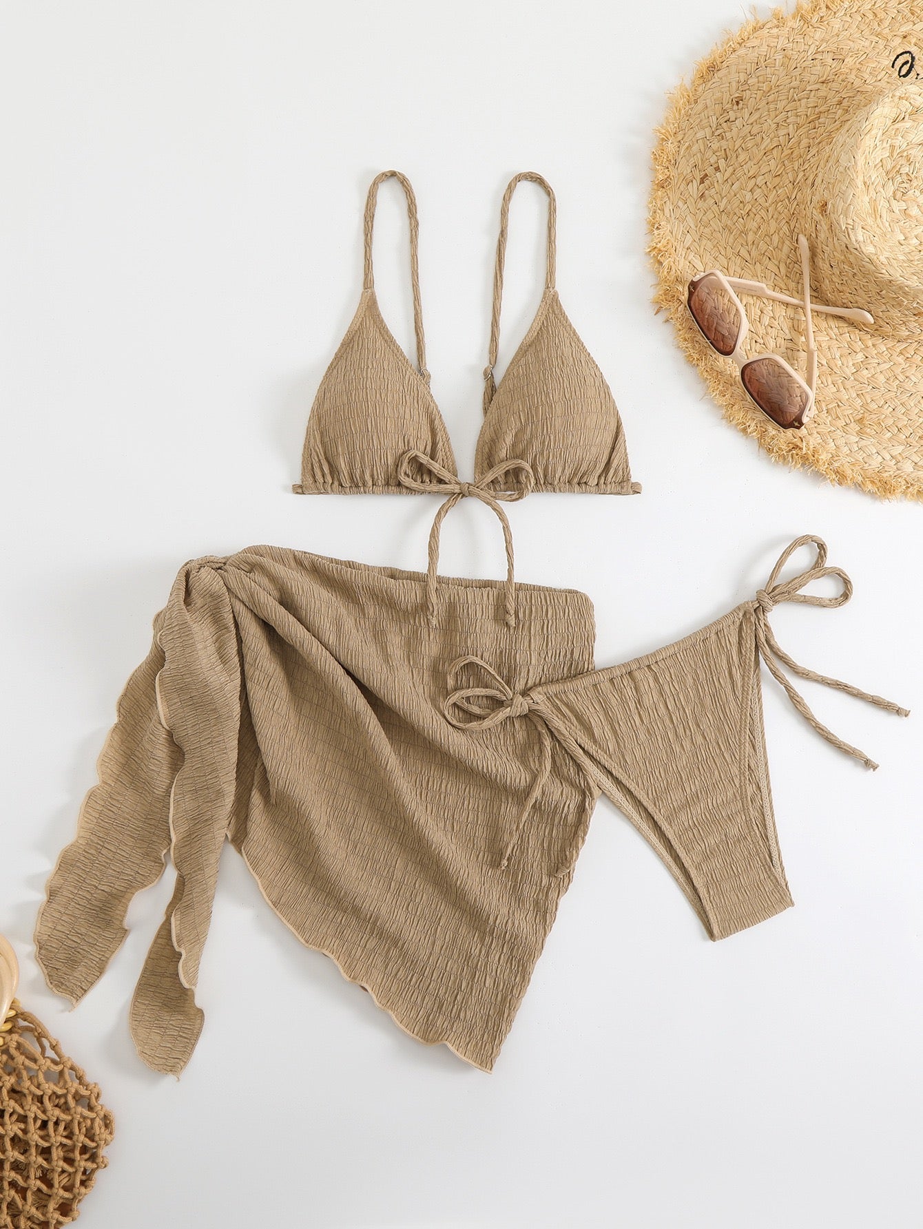 Brown bikini set with matching cover-up on a white background

