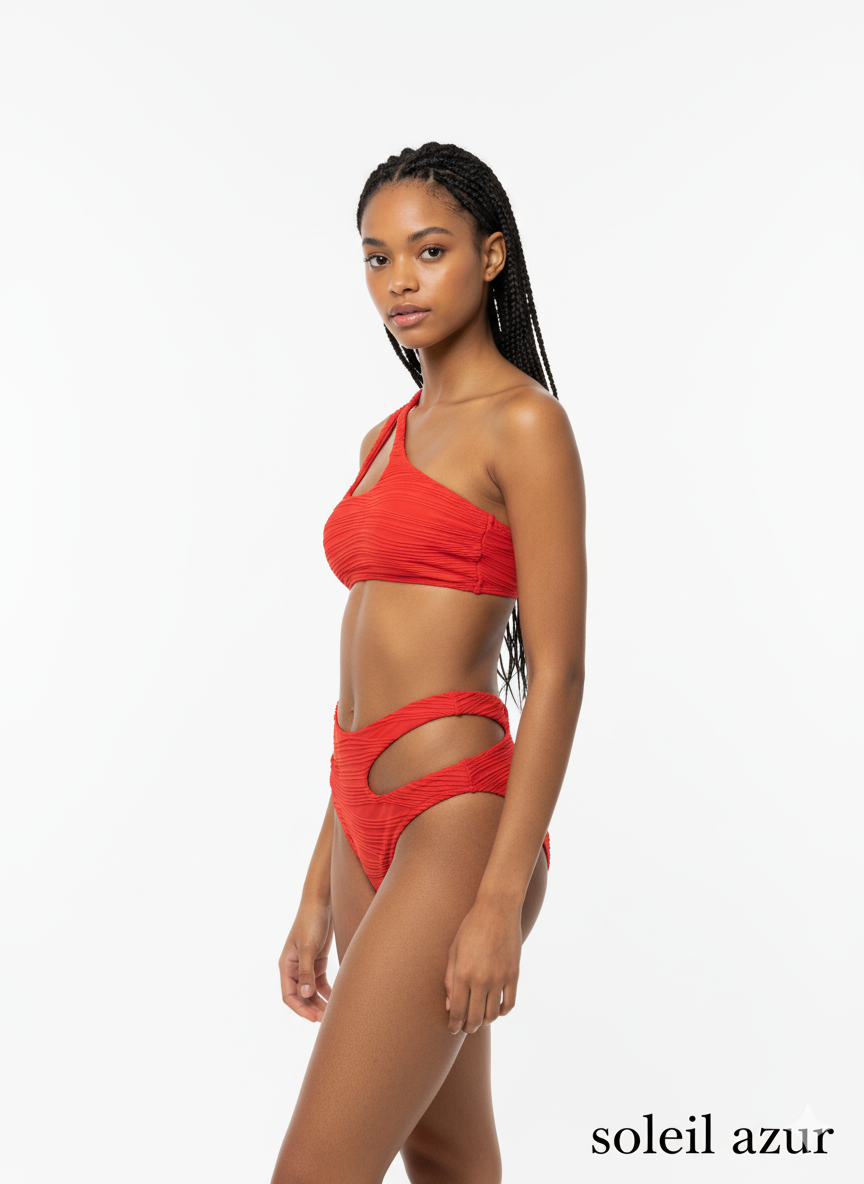 Woman wearing a red bikini with 'soleil azur' branding on a white background